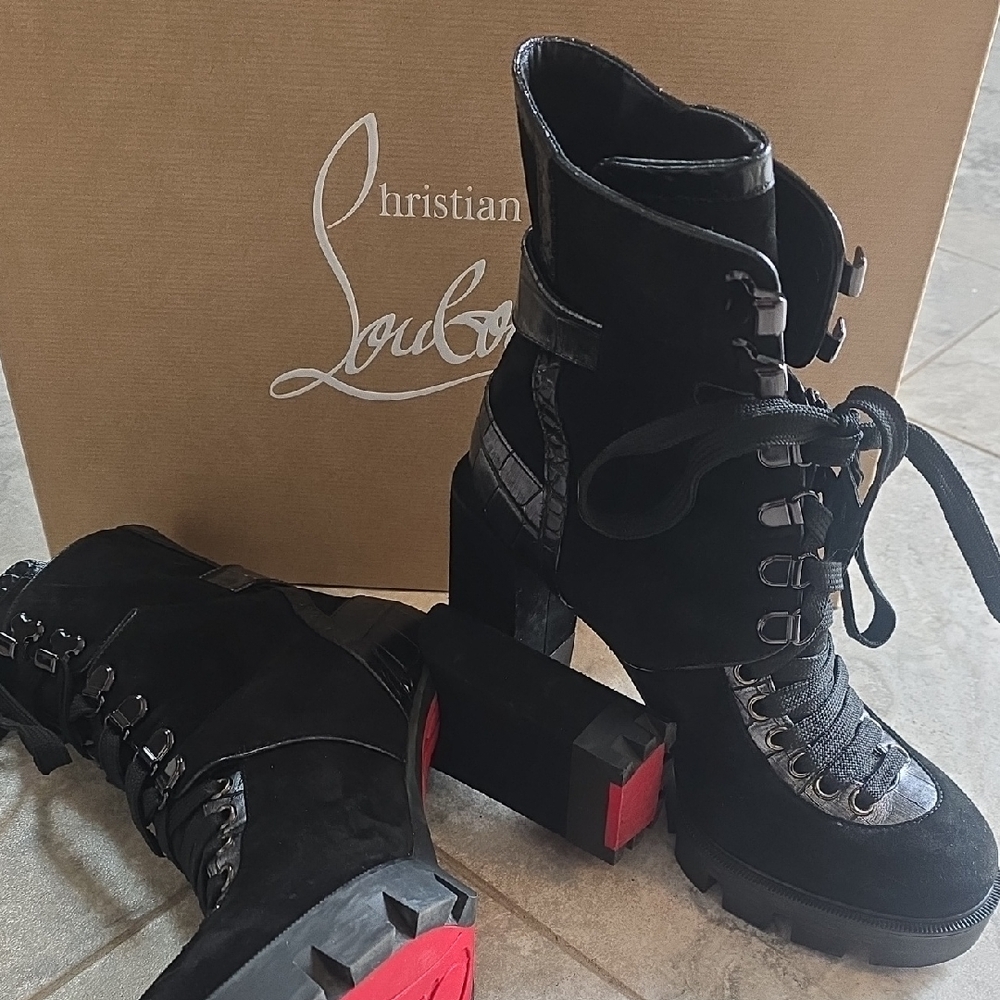 Christian Louboutin Black Lace-Up Boots with Red Soles